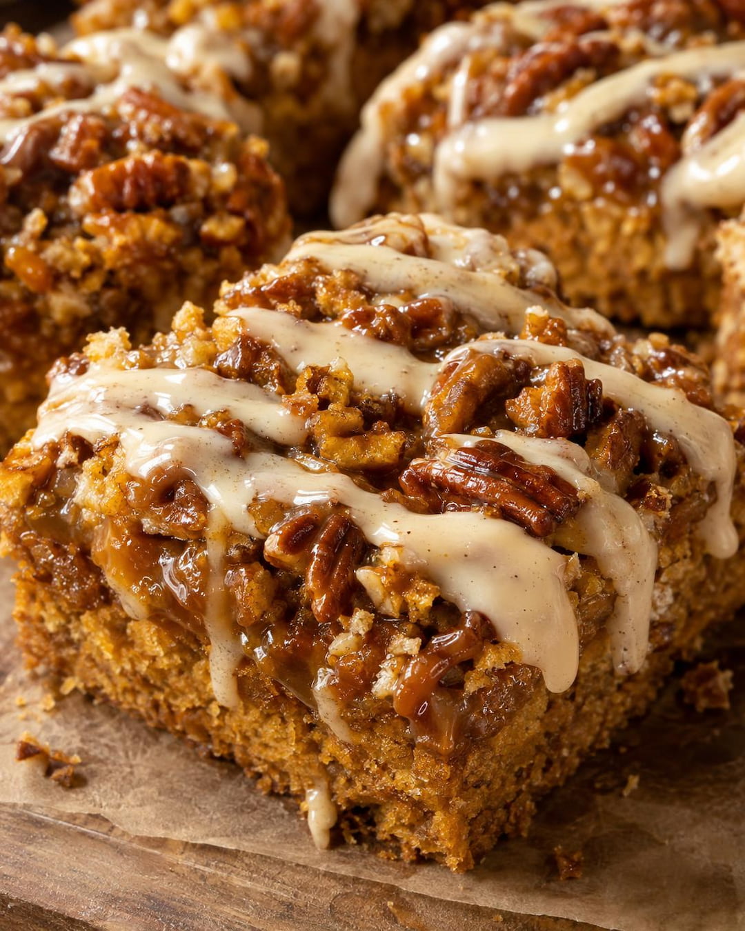 Gooey Pumpkin Caramel Crunch Bars with Bourbon Cream Cheese Glaze